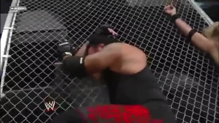 Edge Spears Undertaker throught the Hell in a Cell wall