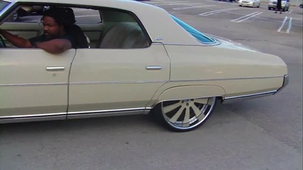 Outrageous 1971 4door Donk doing some Donuts