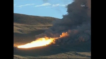 Nasa Atk test fires five - segment solid rocket motor 