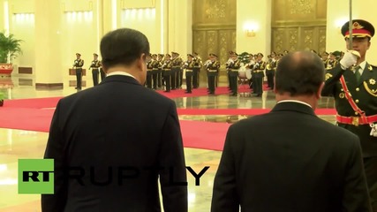 China: Xi Jinping receives Hollande in his two-day official visit to China