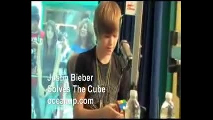 Justin Bieber solving a Rubix Cube