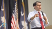 SCOTT WALKER SIGNS CONTROVERSIAL WISCONSIN BUDGET AS HE ANNOUNCES PRESIDENTIAL BID VIA TWITTER... OR DOES HE?