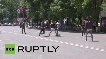 Armenia: Utility protesters play football in Yerevan's barricaded streets