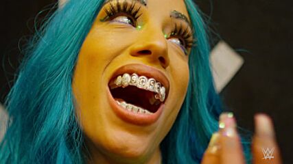 Sasha Banks shows off her new Boss grill