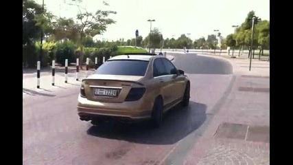 Gold Brabus C63 Amg Hard acceleration in Dubai