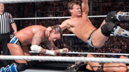 Chris Jericho slams CM Punk into an Elimination Chamber pod: WWE Elimination Chamber 2012