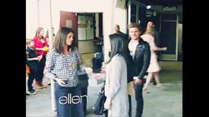 Zac Efron and Taylor Swift dance behind Selena Gomez.
