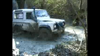 Defender 4x4 in mud