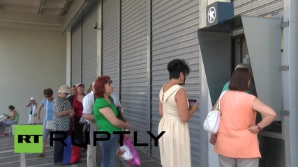 Greece: Athenians queue for cash on day two of bank closures