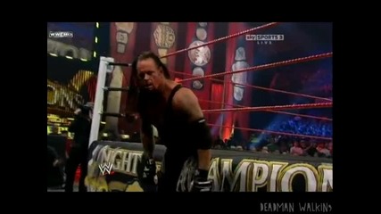 Night of Champions 2010 - The Undertaker Flies over the barricade 