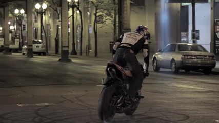Stunt Motorcyclist in Downtown Chicago - Red Bull Night Tracks