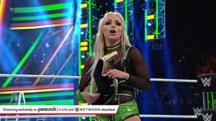 Liv Morgan celebrates after Money in the Bank cash-in: WWE Money in the Bank 2022 (WWE Network Exclusive)