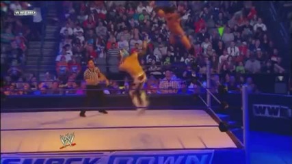 Sin Cara Dropkicks Justin Gabriel in mid air