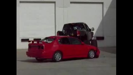 Nissan Titan Crushes Car