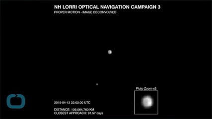New Horizons Delivers First Close-up Glimpse of Pluto and Charon