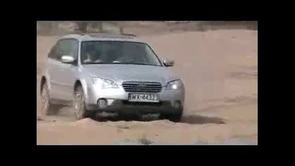Outback H6 on the loose sand 