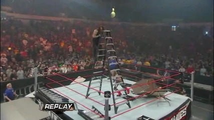 Edge throws The Undertaker off a Ladder throught four Tables