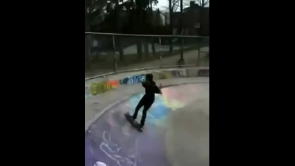 Skater Jumps Over Fence