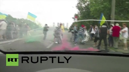 Ukraine: Masked men attack anti-Poroshenko demo