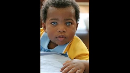 Black baby - blue eyes