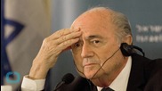 Blatter Defies Calls to Quit as FIFA Scandal Widens