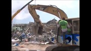 Многоетажна сграда в Гана се срути и затрупа стотици хора