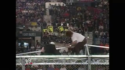 Undertaker throws Mankind off the top of the Hell in a Cell