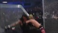 Edge Spears Undertaker throught the Hell in a Cell wall