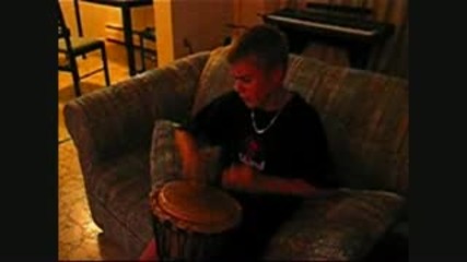 Justin Bieber playing the djembe 