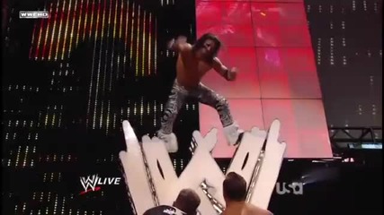 John Morrison jumps out the Wwe Logo