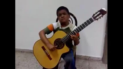 Дете свири песента от филма титаник на китара