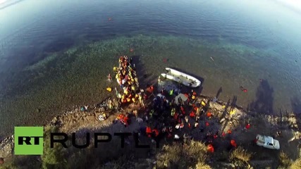 Greece: Drone footage shows refugees being helped ashore by Lesbos volunteers