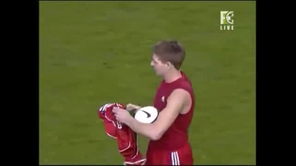 Gerrard takes the ball to Torres