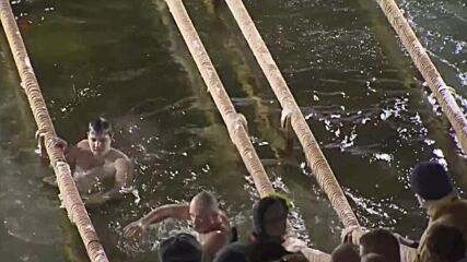 Russia: Orthodox Christians take an ice dip to mark Epiphany
