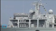 HMS Bulwark Takes Migrants to Italy