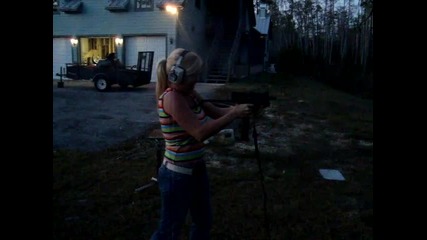 Chick shooting the Mac-10 full auto[1]