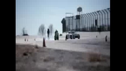 motorcycle vs. car drift battle
