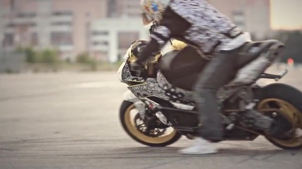 Motorcycle stunts for a girl .