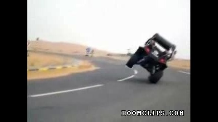 Expert Driving on a Desert Highway . 