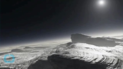Pluto May Have Icy Cap