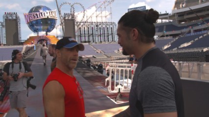 Seth Rollins and Roman Reigns prepare for their WrestleMania entrances on WWE 24 (WWE Network Exclusive)