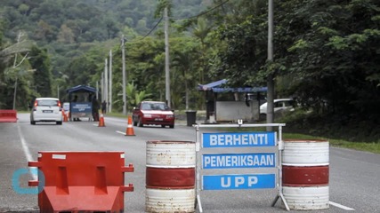Malaysia Digs Up Bodies From 139 Suspected Graves