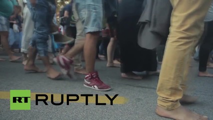 Italy: Protesters march BAREFOOT for refugees in Venice as nationwide demos sweep Italy