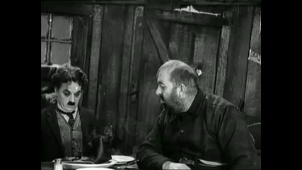 Charlie Chaplin eating his shoe - The Gold Rush (high Quality) 