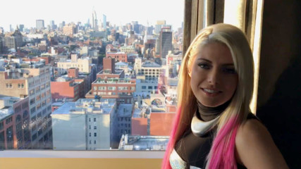 Alexa Bliss takes in the impressive skyline of NYC during SummerSlam weekend
