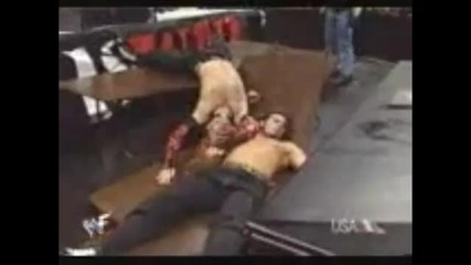 Bubba Ray Powerbombs Jeff Hardy through four Tables with Matt Hardy
