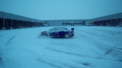 Mitsubishi Evo having fun in the snow 