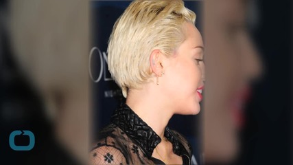 Miley Cyrus Makes a Necklace Using Her Tooth and Poses Topless on Instagram