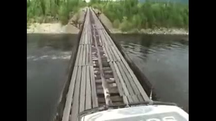Ridiculously dangerous Siberian bridge