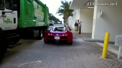 Birdman driving his Bugatti Veyron